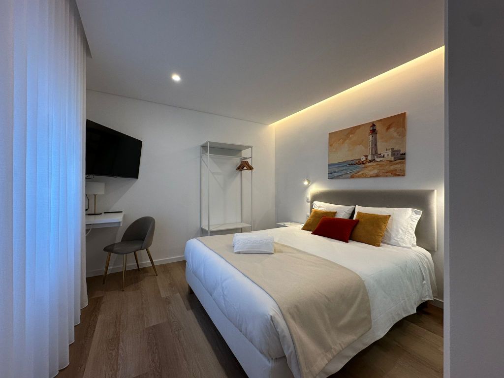 Farol — quarto com quadro de farol